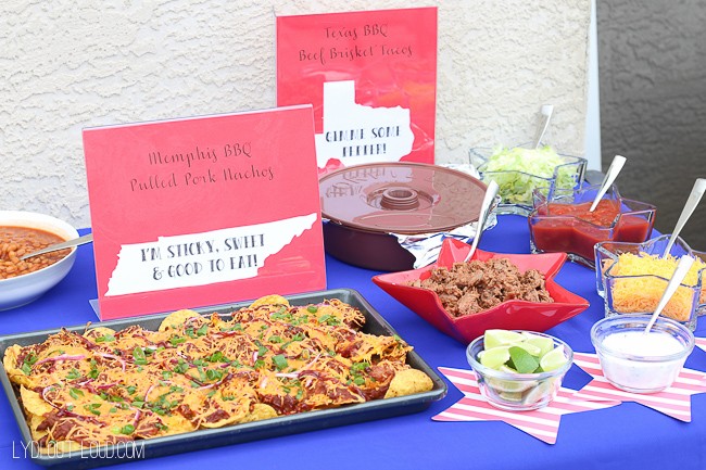 A beautifully arranged food table with various BBQ dishes, perfect for a Memorial Day party.