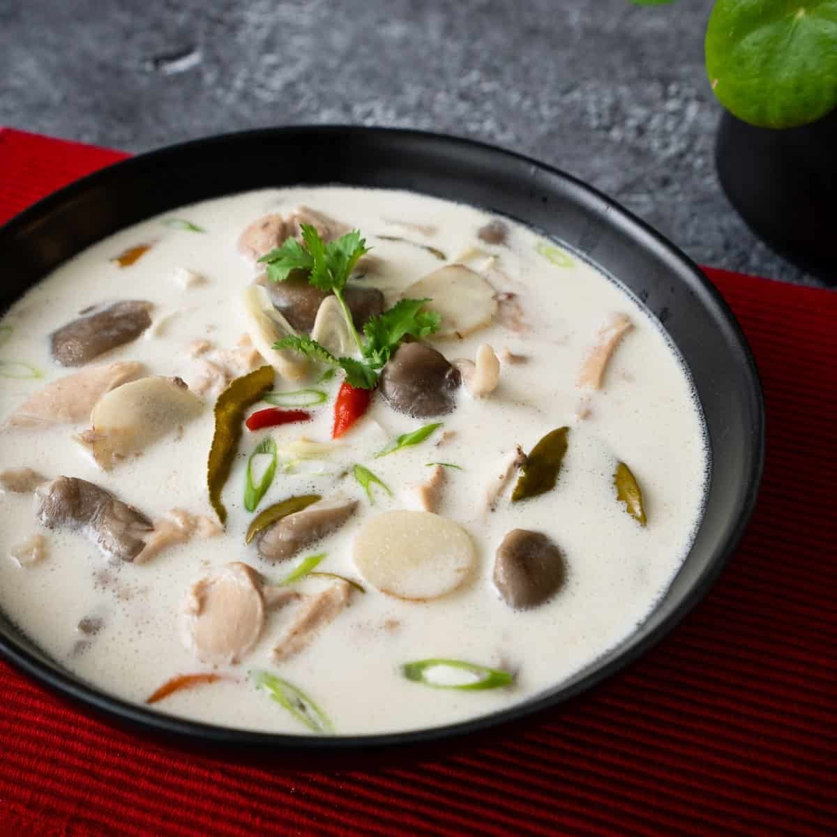 A bowl of creamy Tom Kha Gai soup