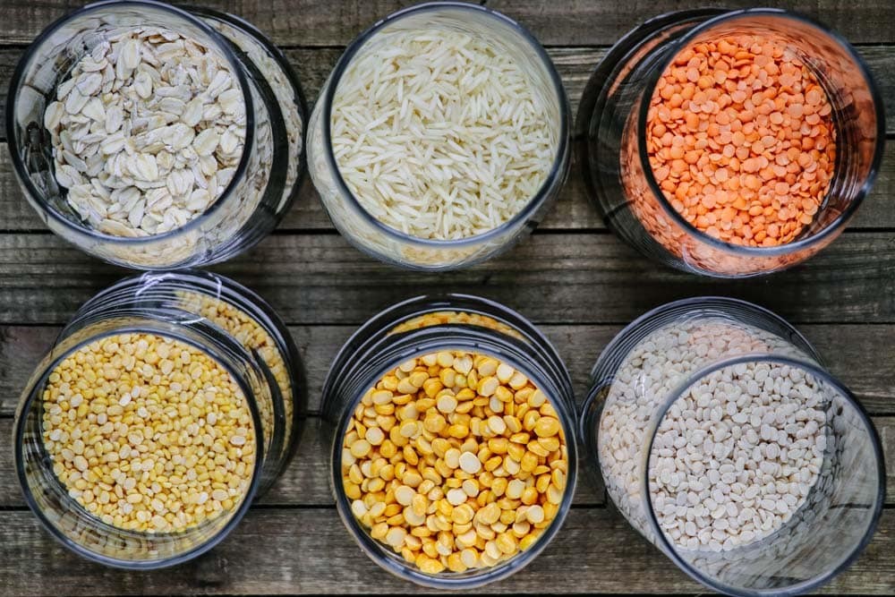 A colorful assortment of lentils and grains essential for making Haleem.