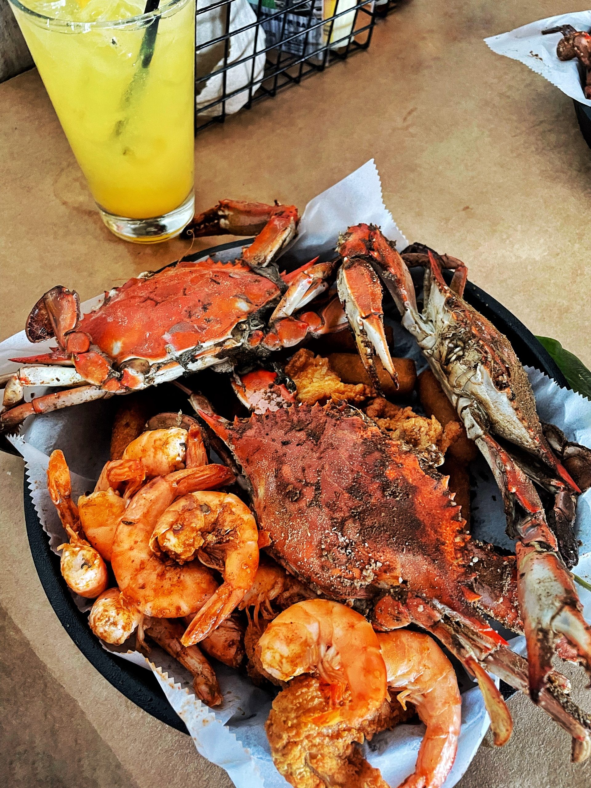 A quintessential Baltimore crab feast featuring steamed crabs.