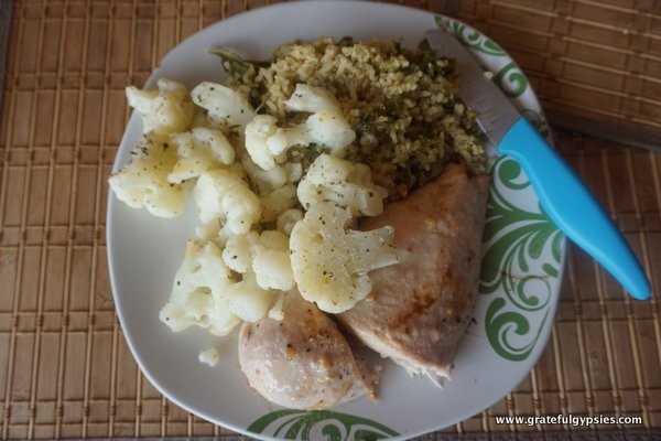 A satisfying home-cooked American dinner with chicken, potatoes, and vegetables.