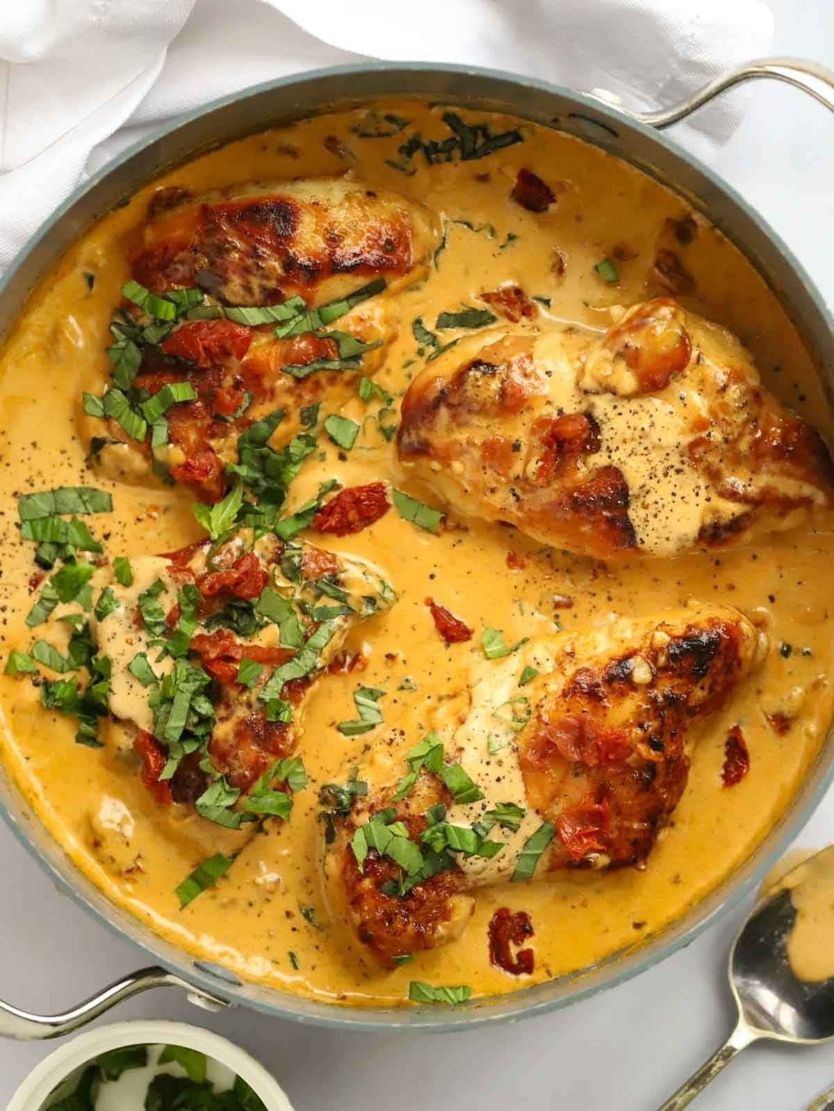 A skillet of perfectly cooked Marry Me Chicken, ready to be served and enjoyed.