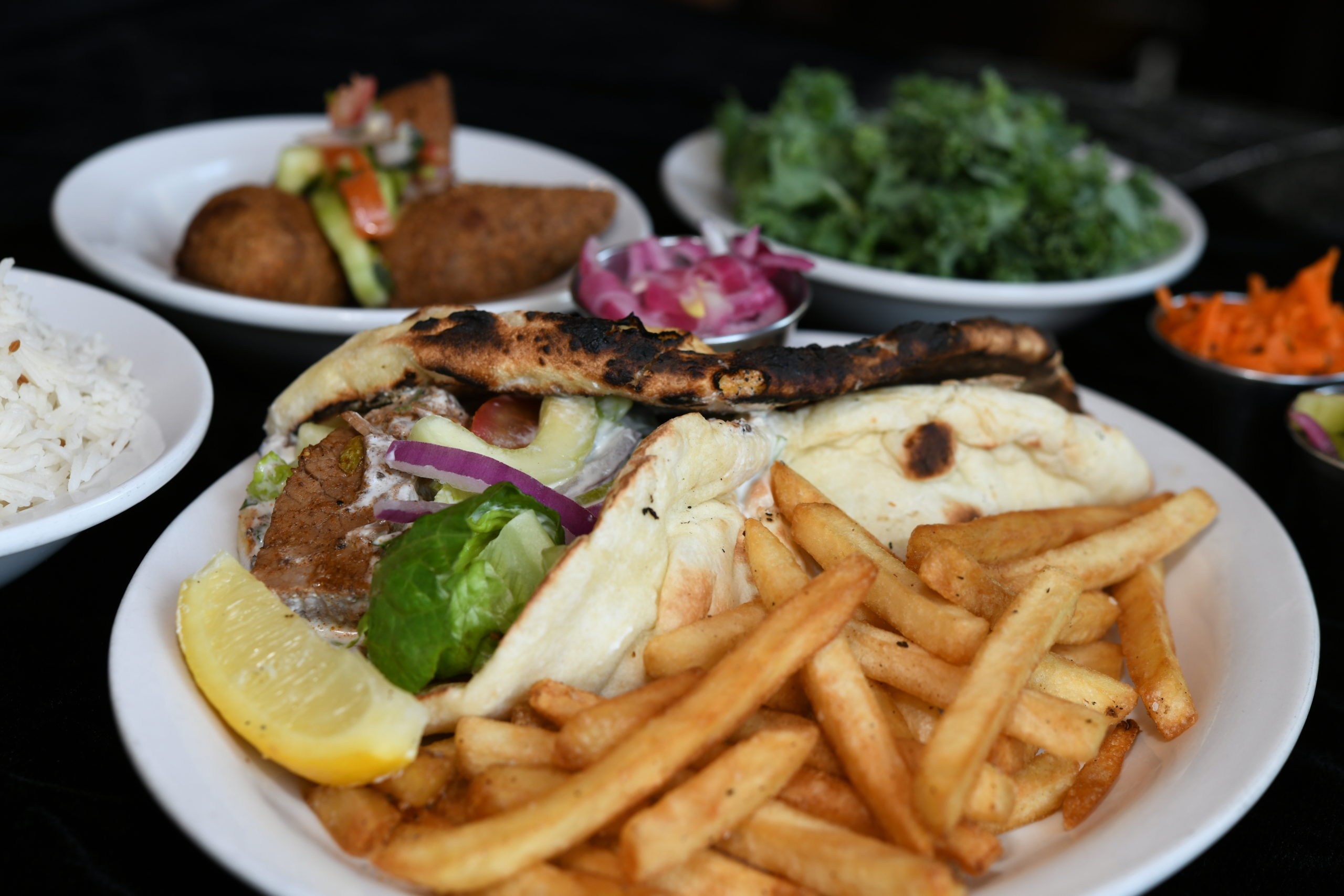 A vibrant and colorful plate of Indian food, showcasing the fresh and flavorful ingredients at Masala in Missoula MT