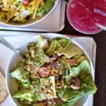 A vibrant and colorful Tuna Poke Bowl at CoreLife Eatery in American Fork, showcasing fresh tuna, greens, and toppings.