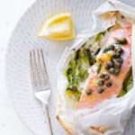 Baked salmon and leek parcel with capers and lemon