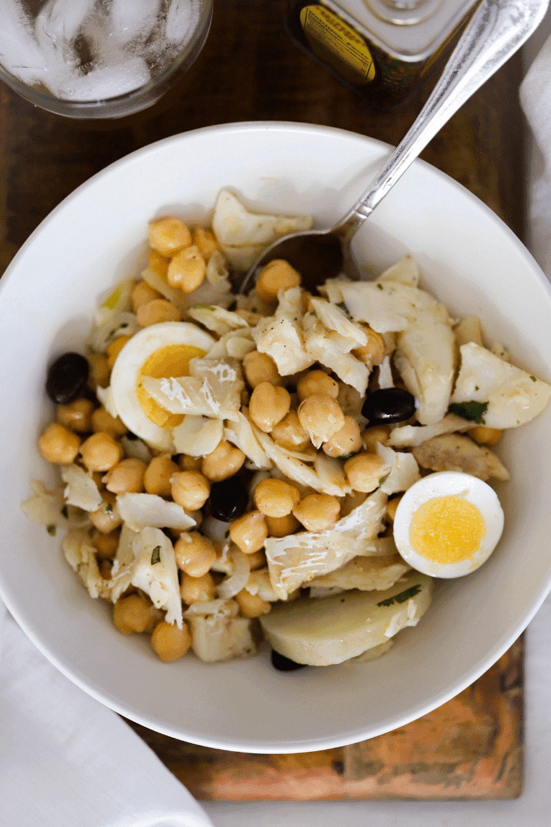 Bowl of bacalhau com grão de bico, Cape Verde food codfish with chickpeas