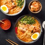 Bowls of Korean ramen from above.