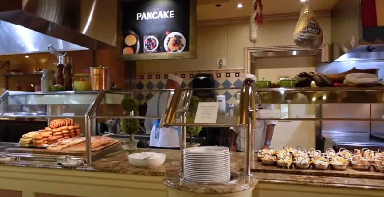 Chefs preparing large pancakes at the Bellagio Buffet pancake station