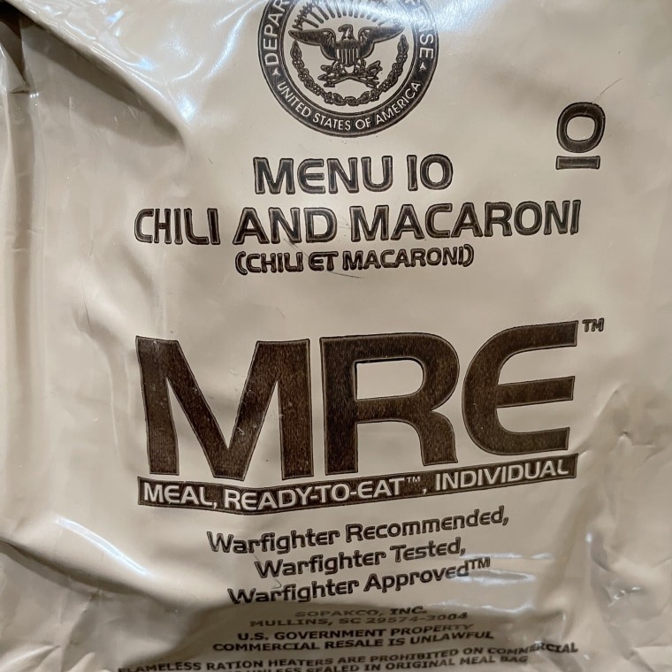 Chili Mac MRE in its tan packaging, appearing unappetizing.