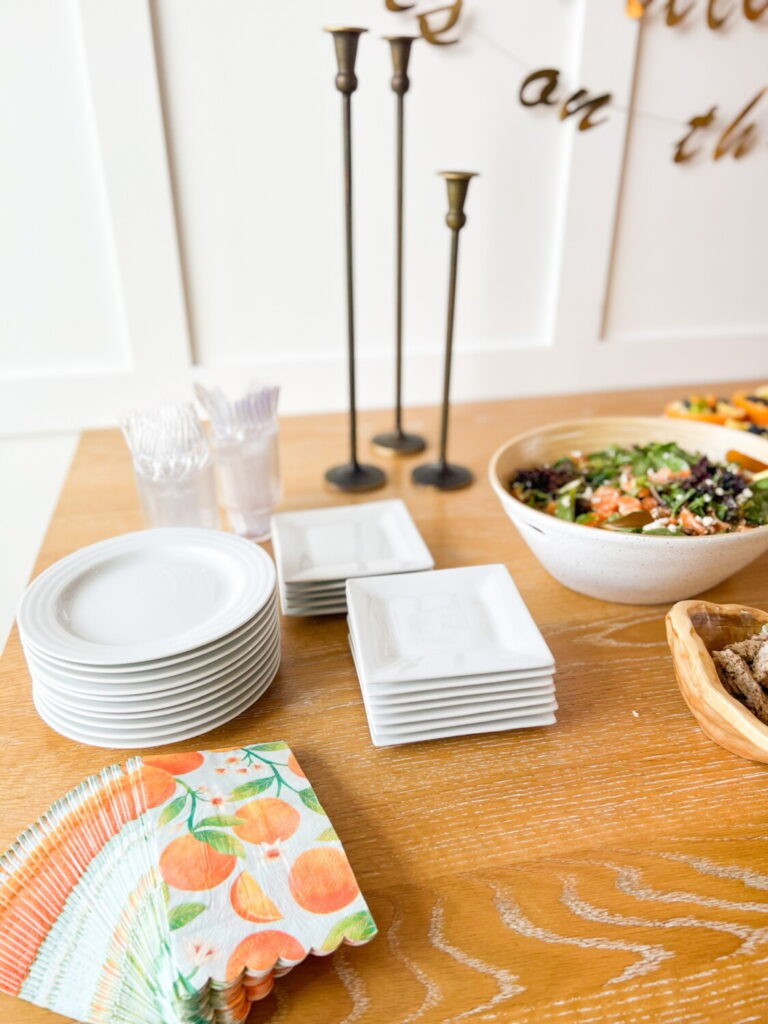 Close-up of cucumber dill tea sandwiches on a white plate, showcasing the delicate layers and fresh ingredients