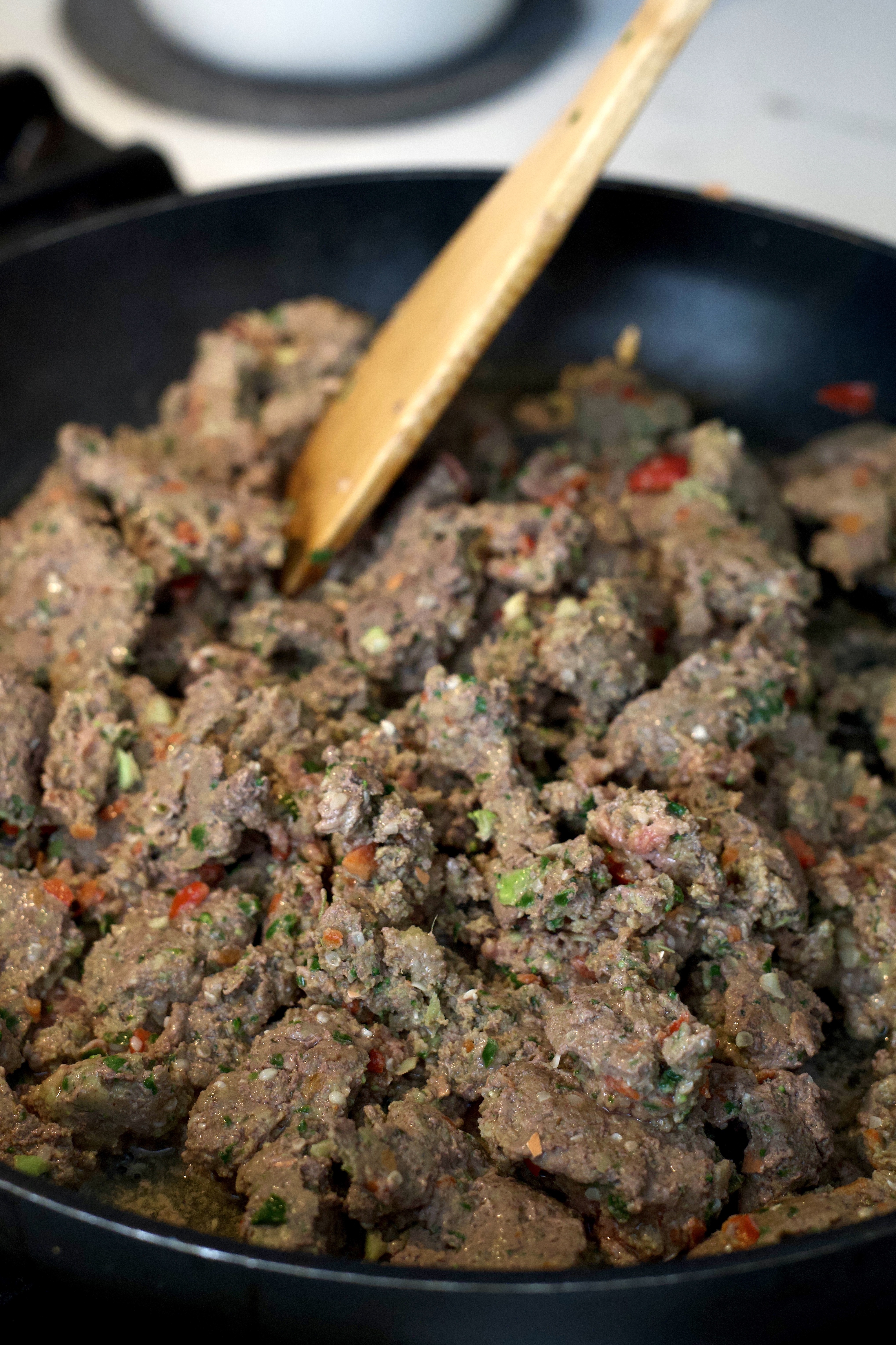 Close-up of prepared homemade dog food, showcasing texture and fresh ingredients