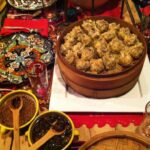 Close-up of Shu Mai dumplings in a bamboo steamer, showcasing the pleated tops and savory filling.