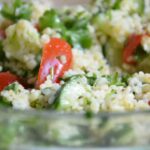 Close-up of vibrant Lebanese Tabbouleh salad showcasing fresh parsley, tomatoes, mint, and bulgur wheat.