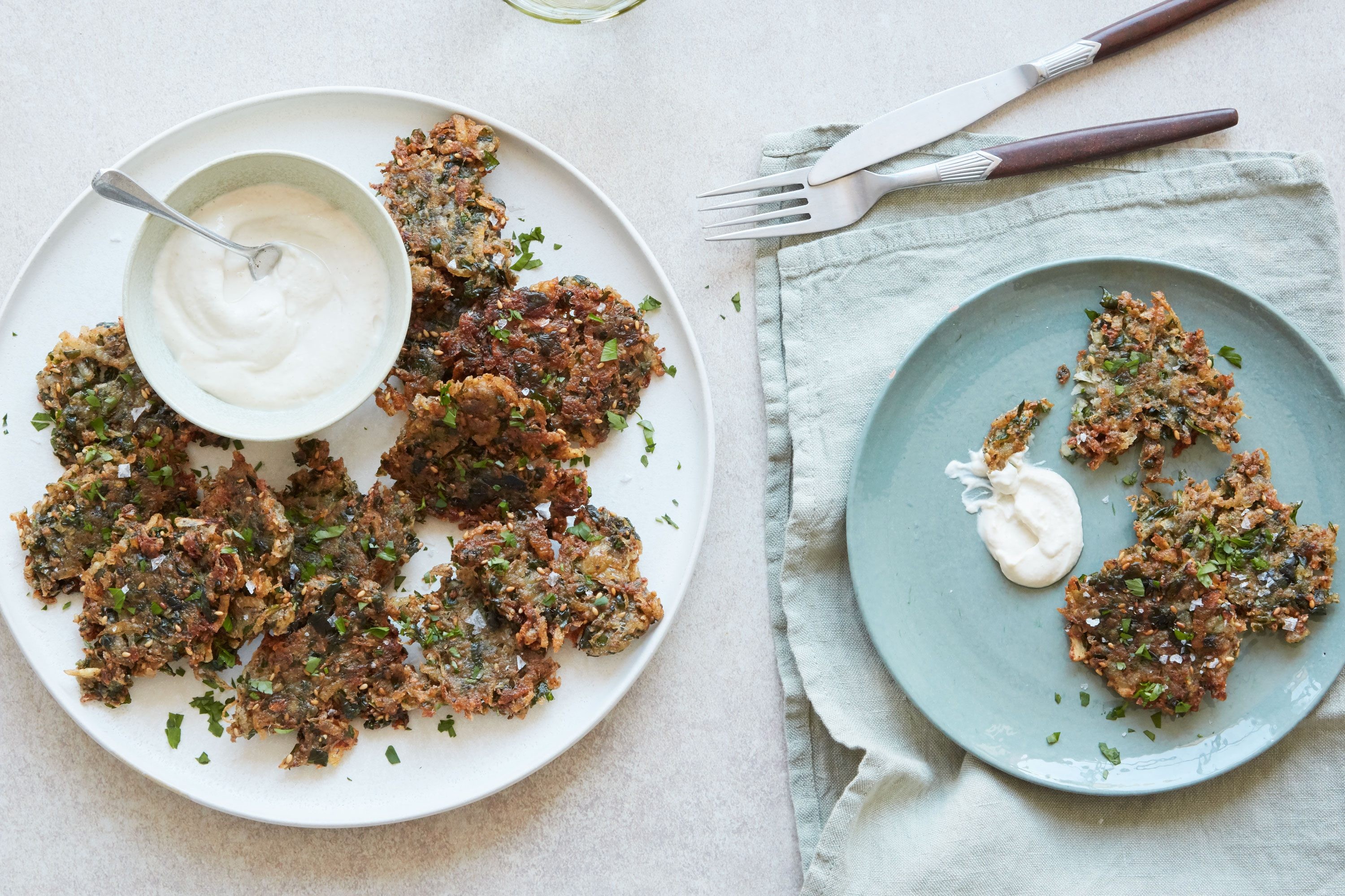 Close-up of Za'atar and herb latkes stacked on top of each other