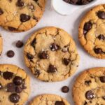 close up shot of gluten-free chocolate chip cookies sprinkled with salt