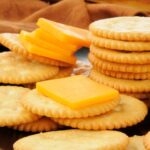 Closeup of a snack plate of cheese and crackers