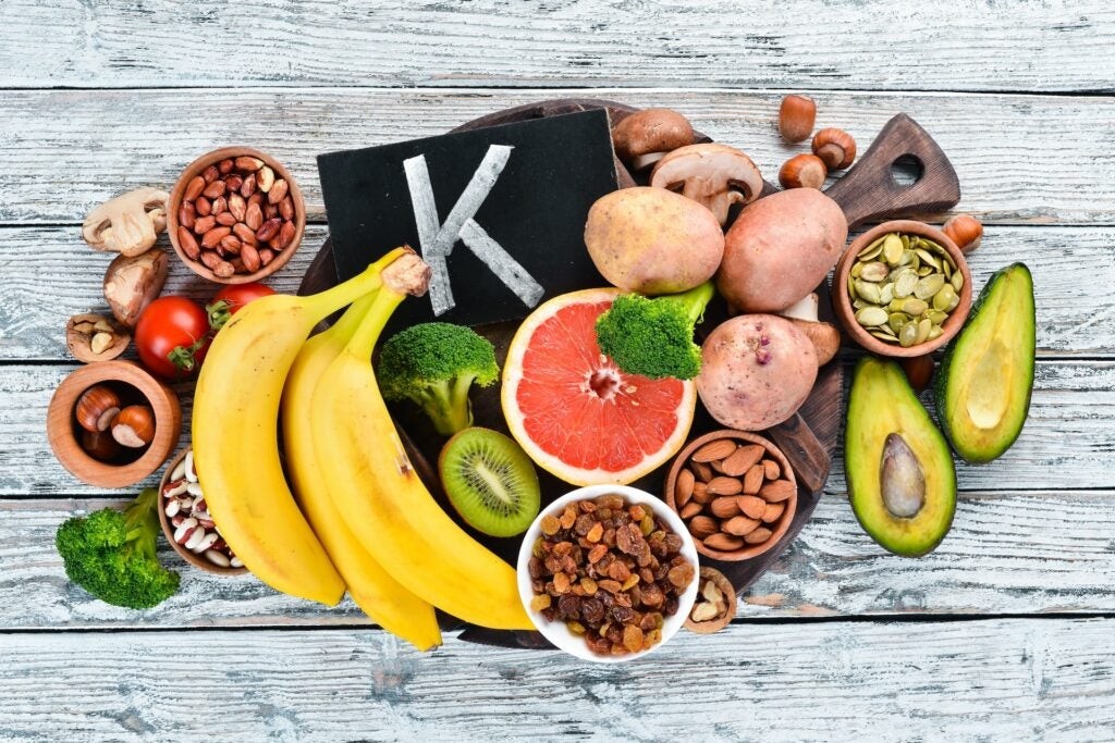 Colorful display of potassium-rich foods including fruits and vegetables, showcasing options for a foods with lots of potassium list