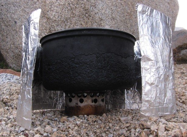 Complete Fancy Feast stove setup with windscreen, showcasing simplicity and efficiency