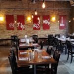 Cozy dining area inside The Pullman restaurant, a top Glenwood Springs food destination.