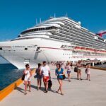 Cruise ship Carnival Dream docked in Cozumel, Mexico, showcasing the destination as a gateway to Mexican culinary adventures.