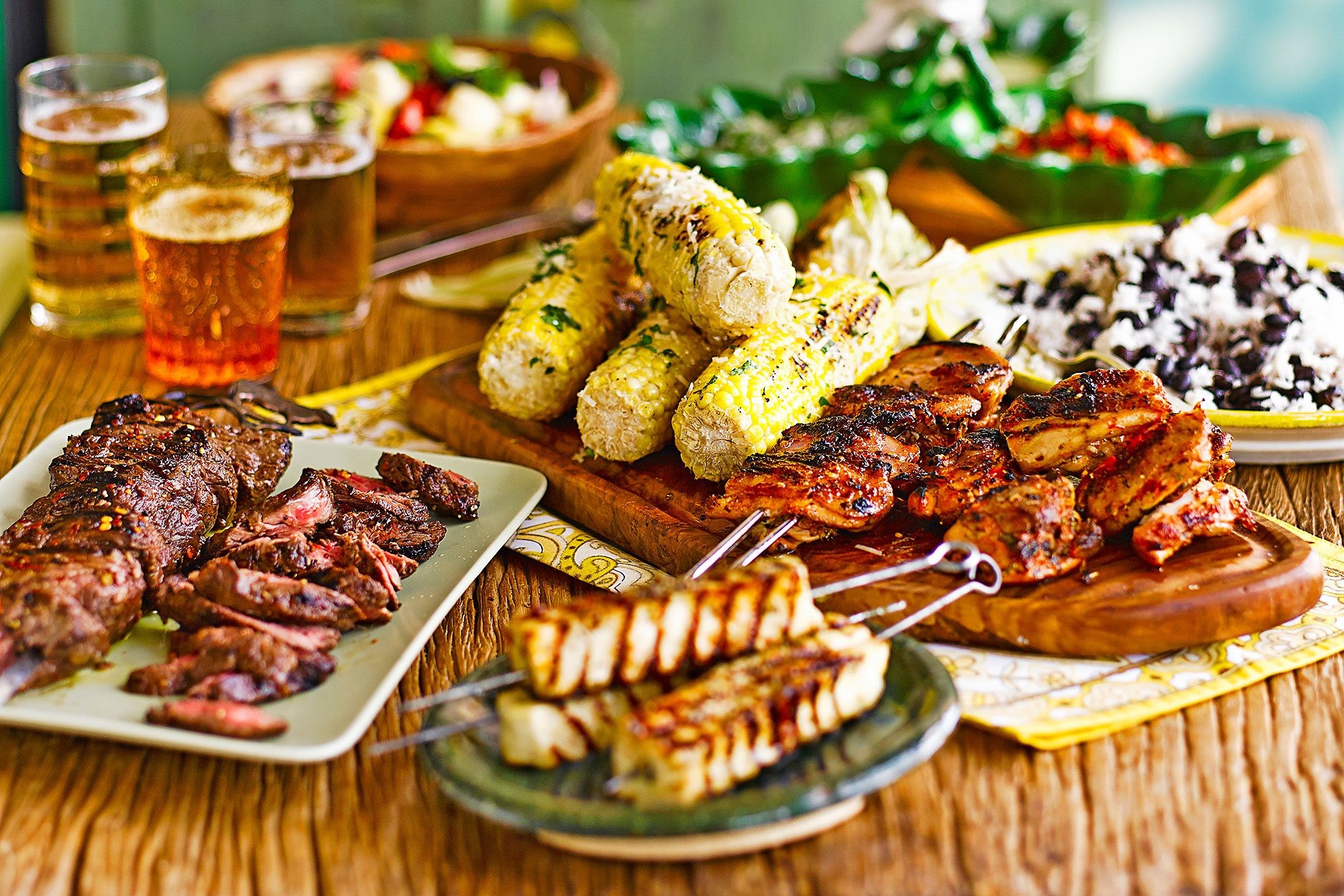 Delicious Brazilian barbecue featuring grilled meats, sausages, and cheese, a staple of Brazil foods.