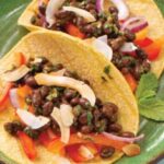 Delicious vegetarian tacos with fresh toppings, showcasing the vibrant flavors of Latin American cuisine.