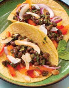 Delicious vegetarian tacos with fresh toppings, showcasing the vibrant flavors of Latin American cuisine.