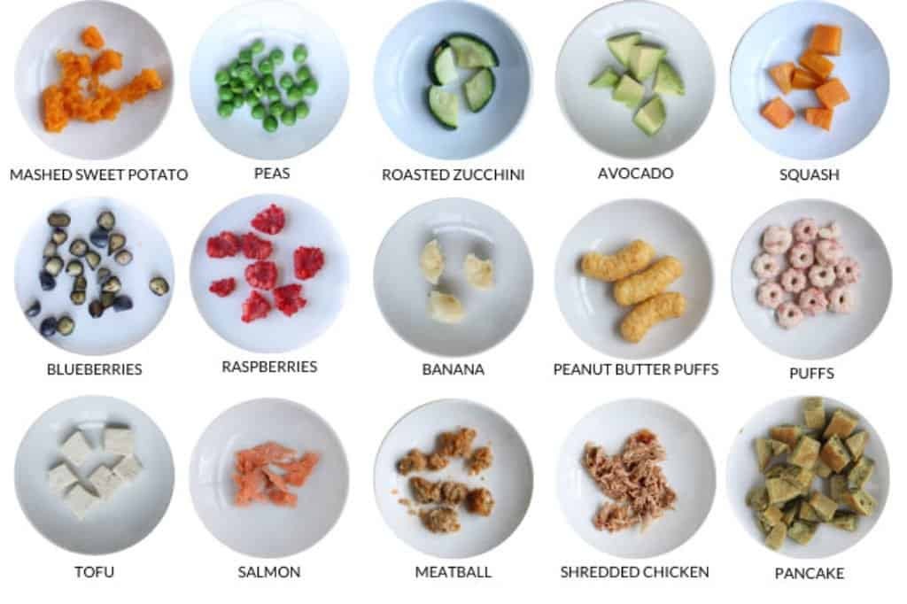 Diverse selection of first finger foods for babies arranged in a grid, showcasing colorful and nutritious options like fruits, vegetables, and soft cooked proteins.