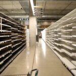 Empty aisles at Midtown Whole Foods Market Houston during closure sale