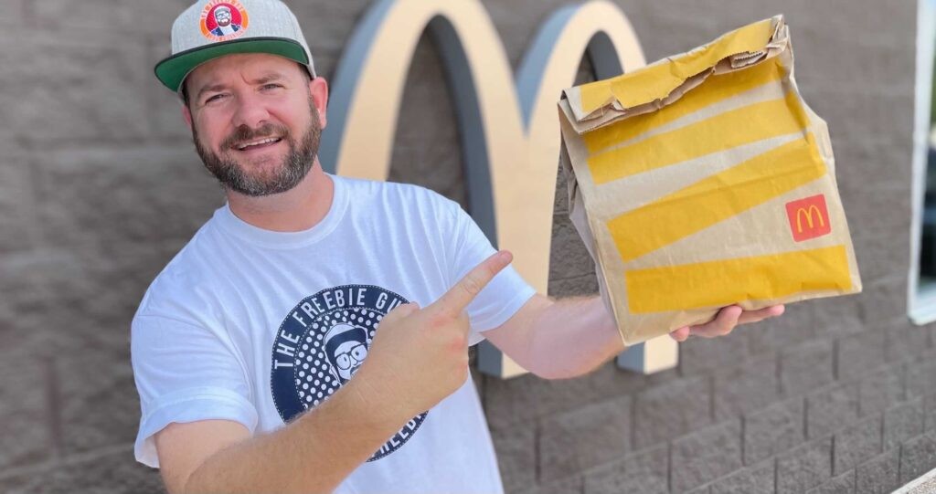 Enthusiastic person points to food deals, encouraging savings on dining out.