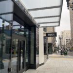 Entrance view of Flock Food Hall in Portland, Oregon, inviting visitors into its culinary space.