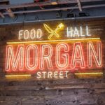 Exterior view of Morgan Street Food Hall in Raleigh, showcasing its urban location and entrance