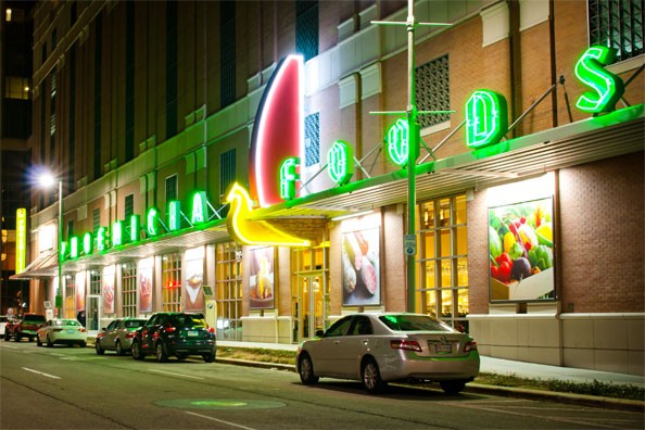 Exterior view of Phoenicia Foods Downtown Houston, a premier gourmet market in One Park Place, showcasing its urban location and inviting entrance.