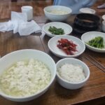 Freshly made soft tofu from Sokcho, Korea, a culinary specialty of the region, showcasing the importance of local ingredients in Korean cuisine.