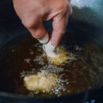 Frying chicken in wok, thewoksoflife.com