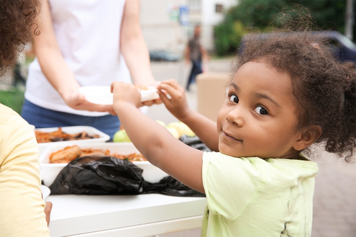 Girl Receiving Food