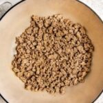 Ground turkey cooking in a pan for easy pasta dinner recipe