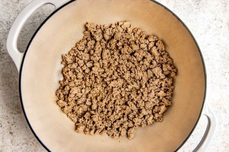 Ground turkey cooking in a pan for easy pasta dinner recipe