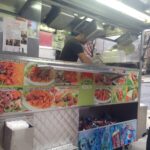 Halal food cart at Temple University serving customers