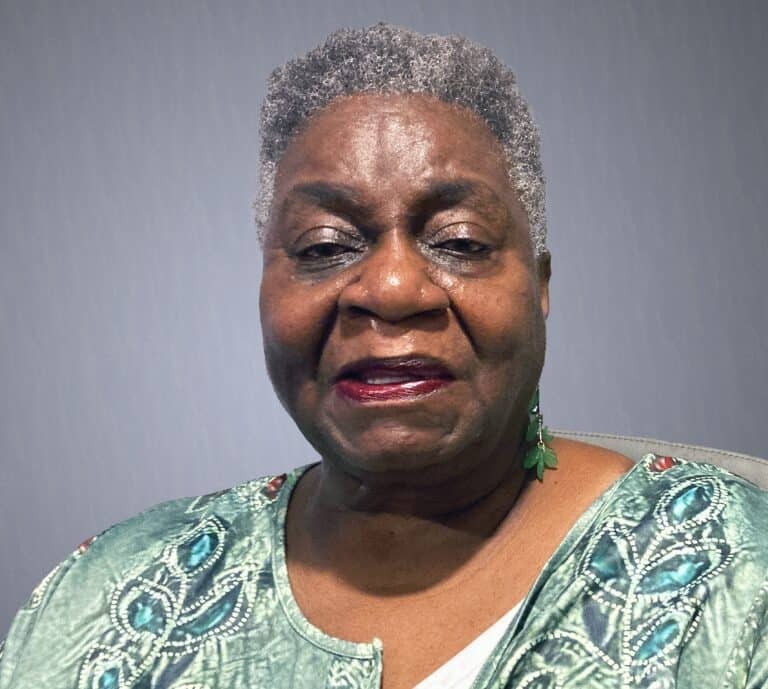 Image of Lynn from Baton Rouge, a food recipient turned volunteer, highlighting community support in Baton Rouge.