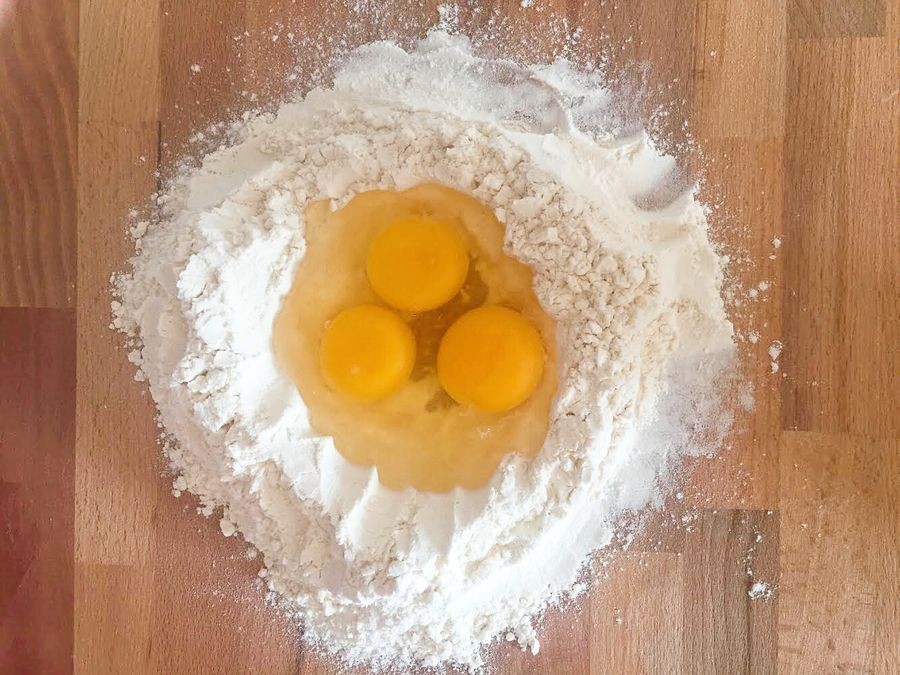 Ingredients for homemade pasta: eggs and flour