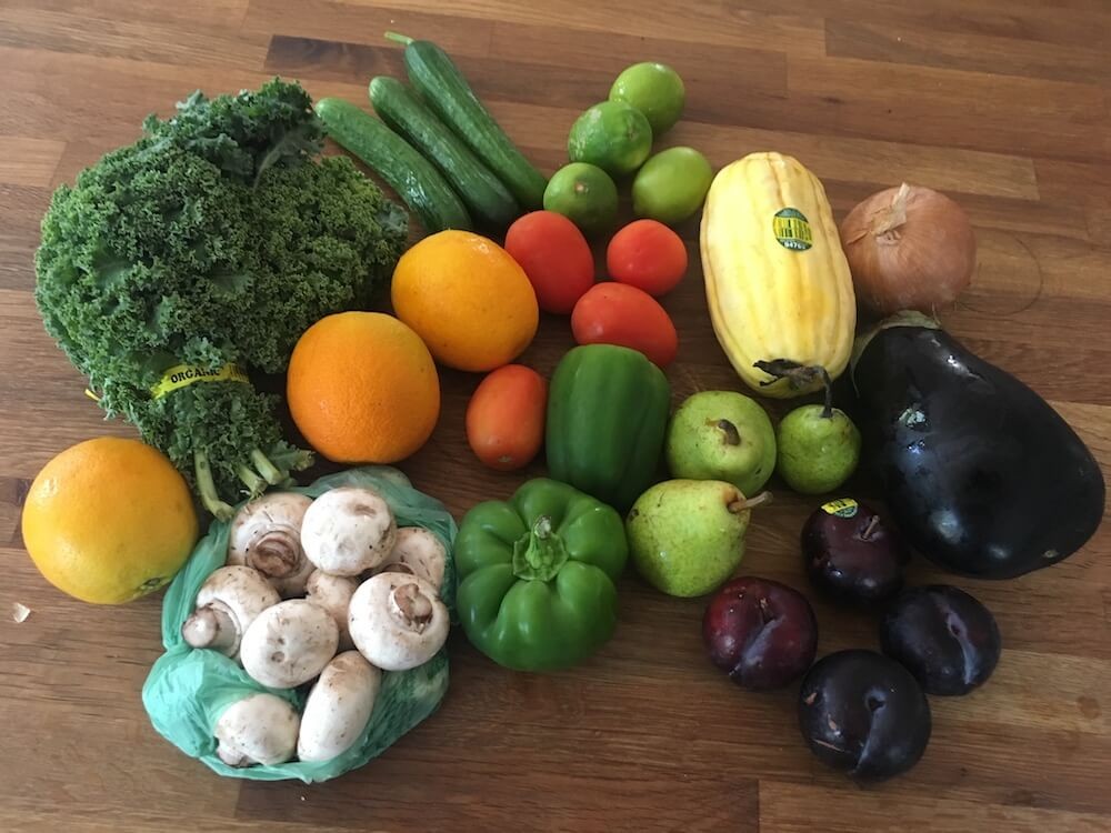 Inside a Misfits Market delivery box, showcasing the variety of rescued produce