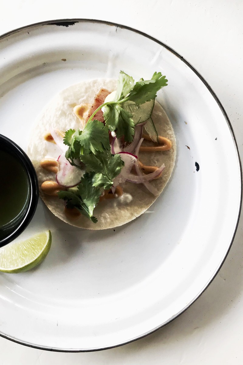 La Rustica's beautifully plated seafood dishes, including pulpo tacos and tostadas