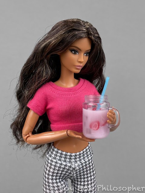 Lena doll with vastly oversized Miniverse coco-berry milk jar