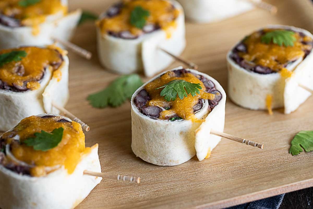 Mexican Pinwheels Appetizer: Easy Vegetarian Tortilla Roll Ups with Black Beans and Cheese