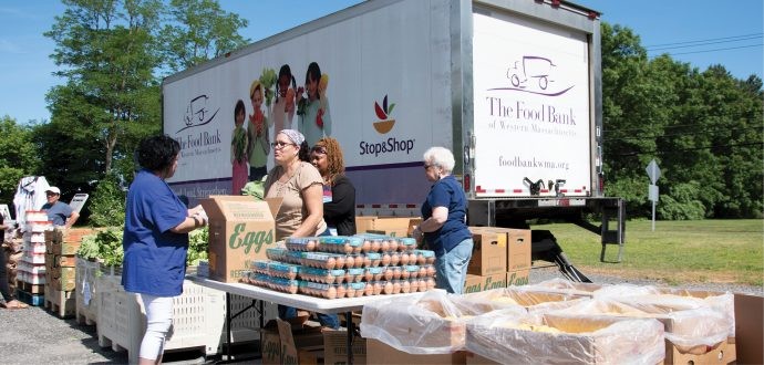 Mobile food bank delivering groceries to a community in Western Massachusetts, highlighting the impact of food bank programs