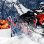 Muffpot food heater attached to an ATV, showcasing a hot meal ready to enjoy during outdoor adventures.