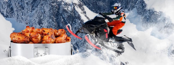 Muffpot food heater attached to an ATV, showcasing a hot meal ready to enjoy during outdoor adventures.