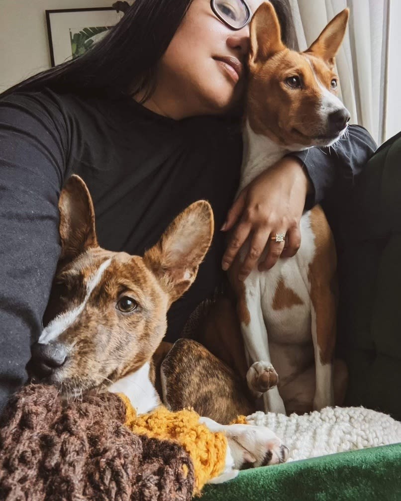 Nori De Vega with her two basenjis, Anouk and Klaus