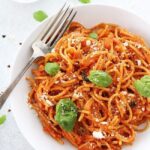 Pasta Pomodoro ingredients: tomatoes, basil, garlic, olive oil, and pasta